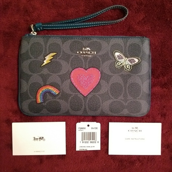 Coach Handbags - 🆕 Coach Logo Souvenir Emblem Large Wristlet